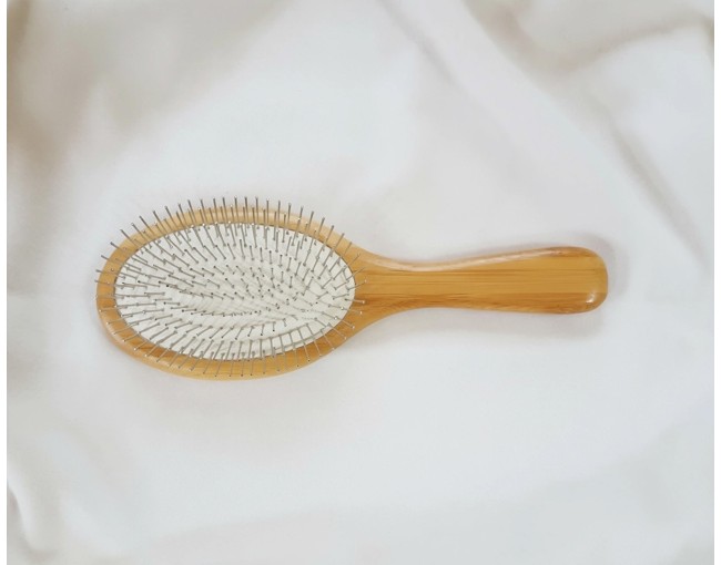 Large round metal hairbrush